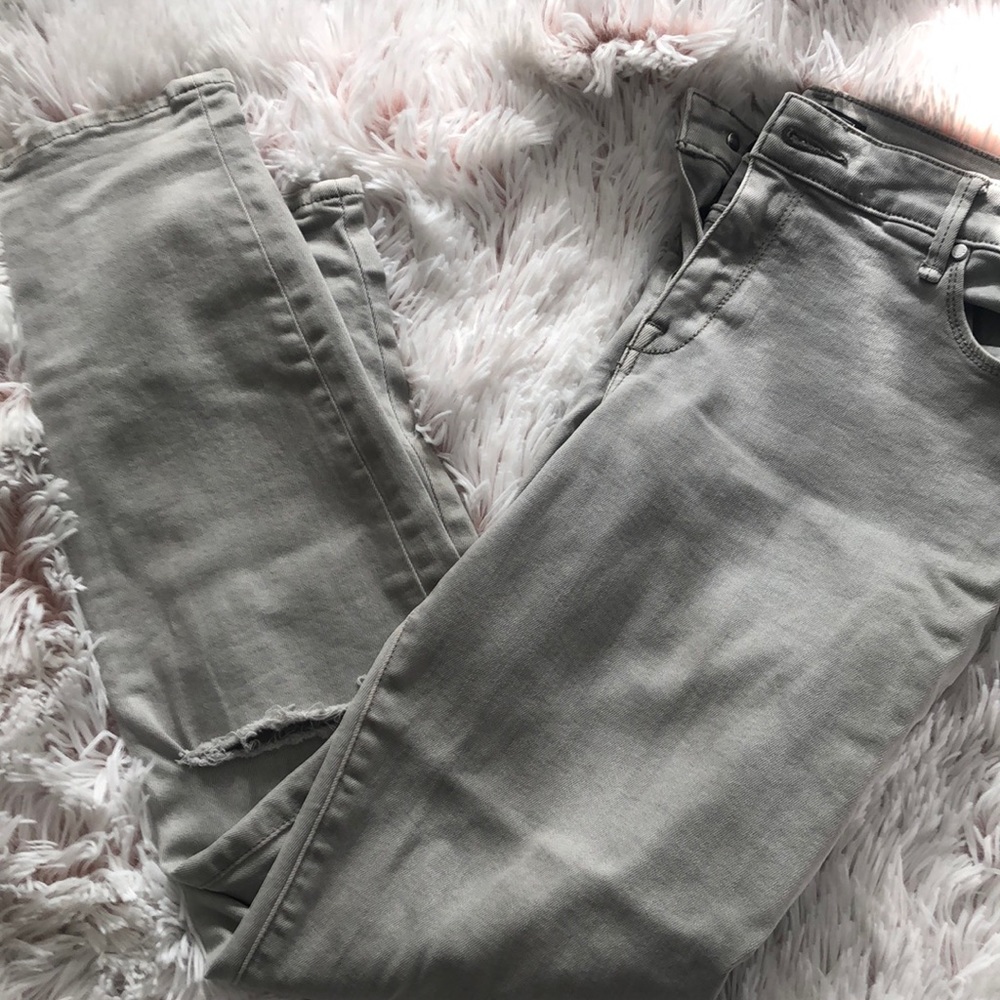 Skinny Abercrombie jeans with tears in knee.